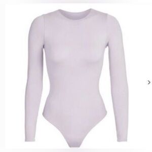SKIMS Soft Purple Long Sleeve Bodysuit. NWOT